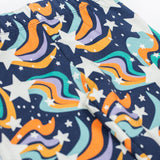 A close up of the Frugi Magic Skies Organic Cotton Cosy Flared Leggings. These warm cotton leggings are lined with a Brushback Fleece surface inside. These leggings are part of a wide range of organic cotton clothing for children available here at Babipur. 
