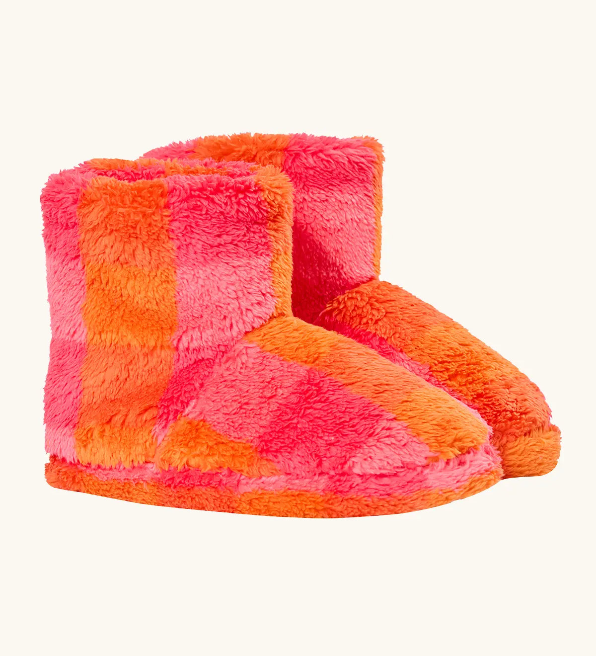 A pair of frugi plush, fuzzy ankle slippers in a bright orange and pink checkerboard pattern.