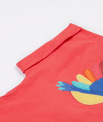 A close up of the Frugi Daisy Applique T-Shirt in Watermelon's folded sleeve.