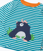 Close up of the Frugi discovery long sleeve top in a boat blue Breton stripe with a mole applique on the front with a worm on it's head.
