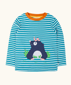 Frugi discovery long sleeve top in a boat blue Breton stripe with a mole applique on the front with a worm on it's head.