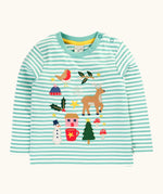 Frugi discovery organic cotton long sleeved top in miss green stripe with winter appliques. Robin, mistletoe, bobble hat, reindeer, holly, house, hot chocolate, snowman, tree, mushroom and stars. 