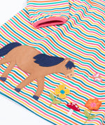 A close up of the horse applique on the front of the Frugi dolcie organic cotton child's dress. 