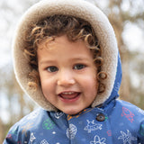 A child walking outside