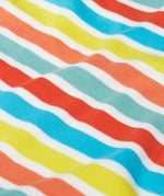 A close up of Frugi Dune Romper in Sea Rainbow Stripe print.