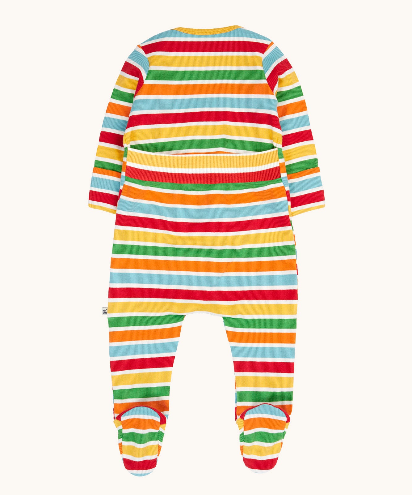 The back of the Frugi easy dressing rainbow striped ribbed material babygrow. easy access on the back to roll off the legs off for easy nappy changes. 