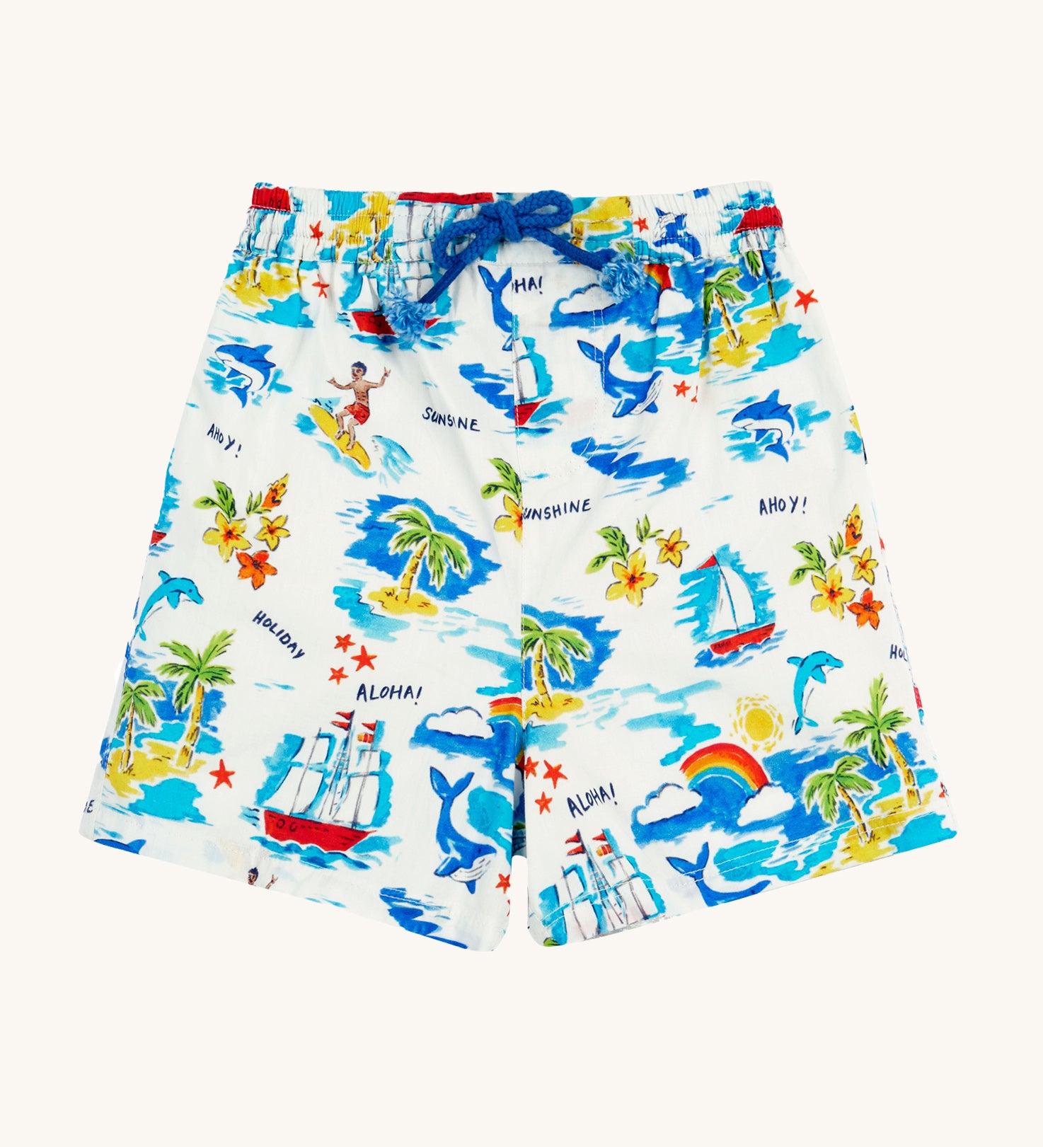 Frugi Aloha Edie Shorts laid flat, featuring an all-over tropical print with sailing ship, dolphins, rainbows, palm trees, surfers and beach motifs on a white background.