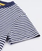 A close up of Frugi Elijah Applique T-Shirt in Navy Blue Stripe's sleeve.
