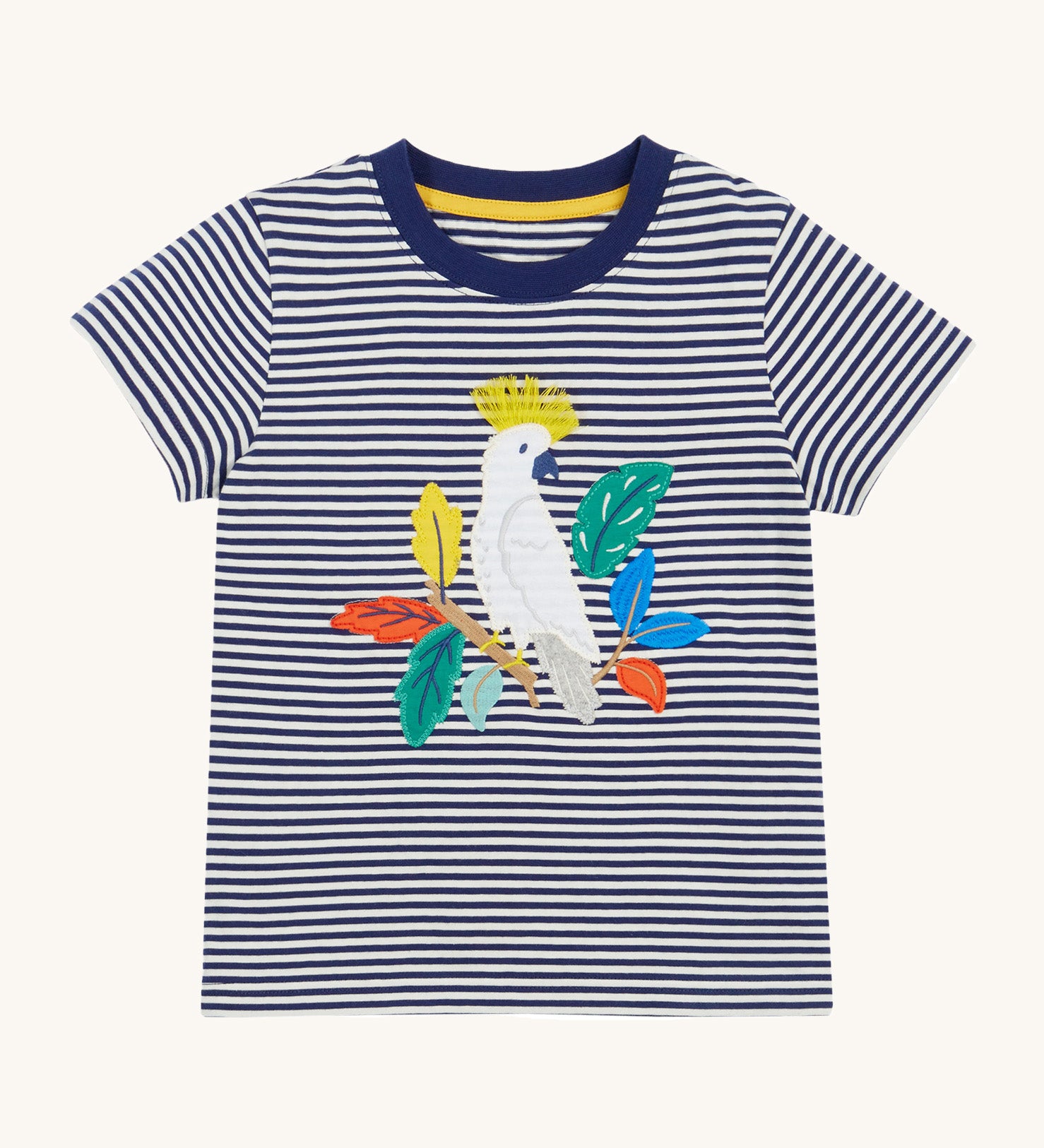 Frugi Elijah Applique T-Shirt in Navy Blue Stripe laid flat, with an embroidered Cockatoo in the centre and a navy blue collar.