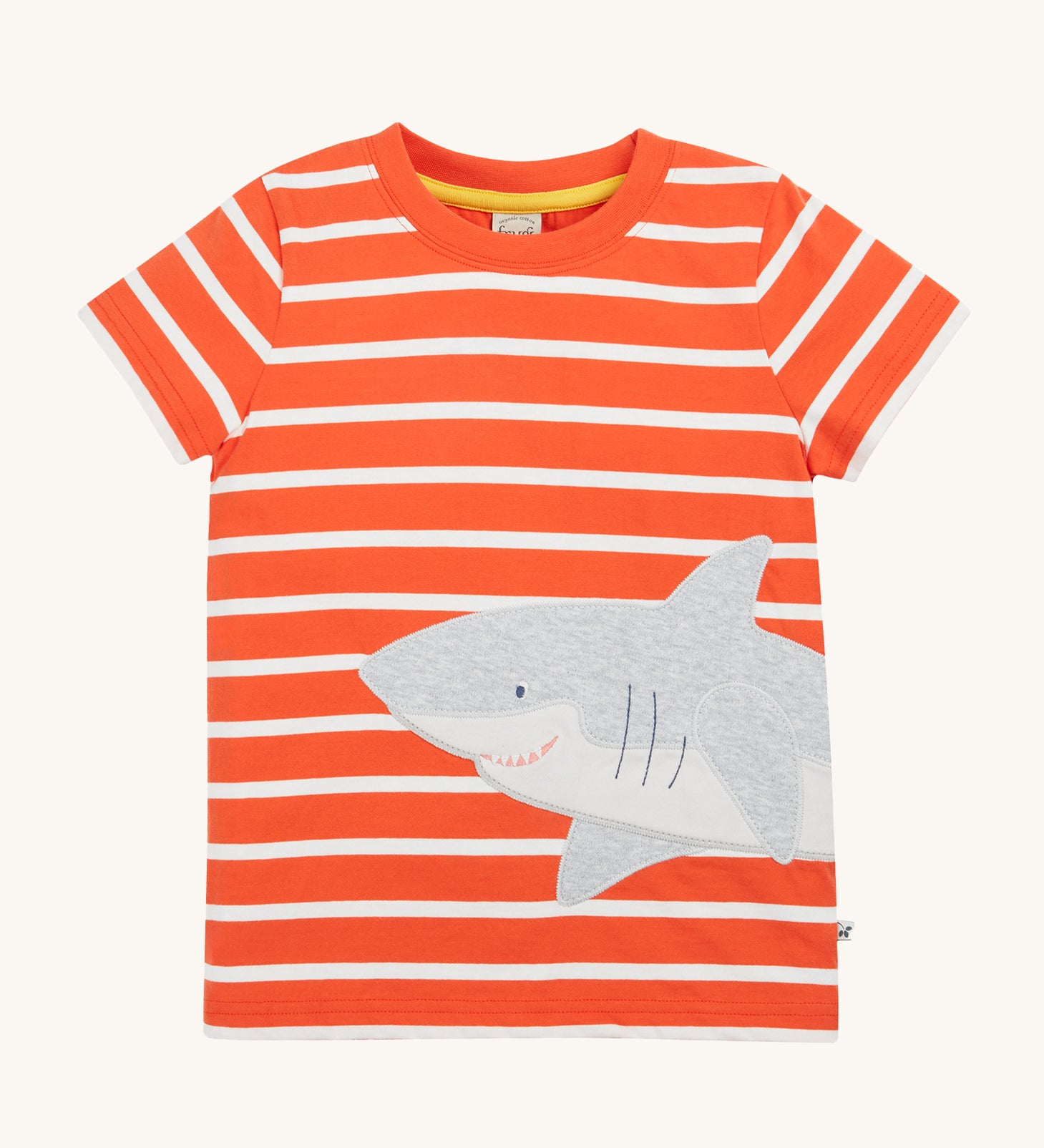 Frugi Elijah Wrap Around T-Shirt in Orange Stripe laid flat, featuring an embroidered shark.
