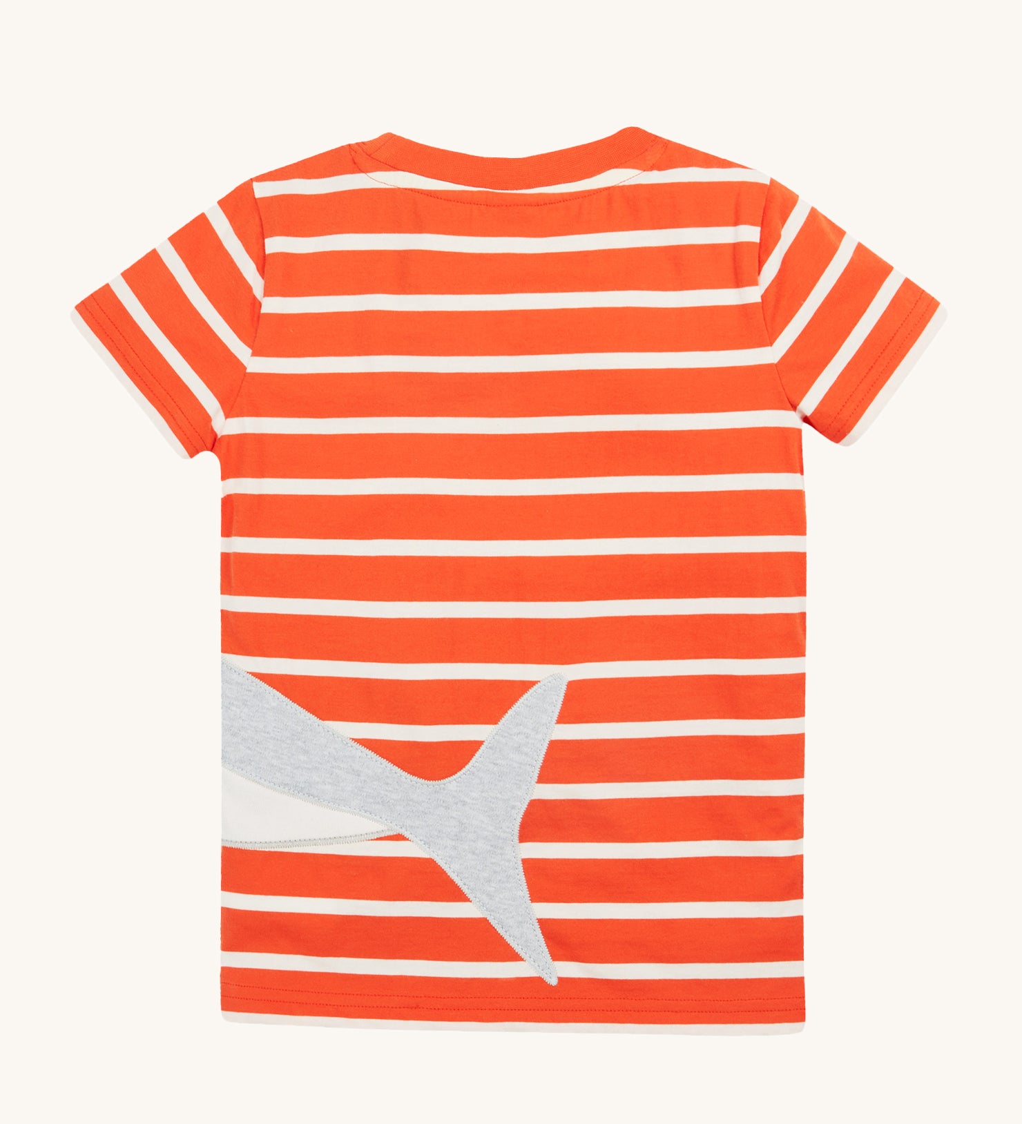 Frugi Elijah Wrap Around T-Shirt in Orange Stripe laid flat, featuring an embroidered shark's tail.