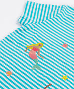 A close up of Frugi Ennis Embroidered T-Shirt in Moss Stripe's sleeve, featuring swimming Mermaids in the centre.
