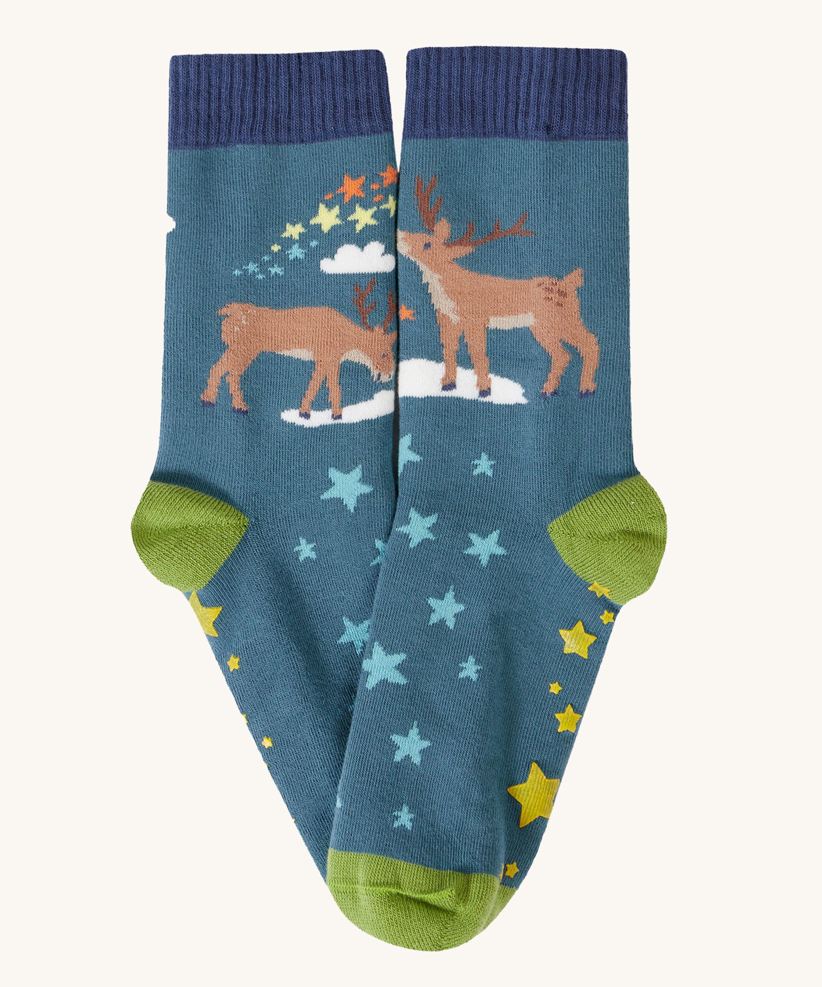 The reindeer socks from the Frugi Festive Reindeer Great Organic Cotton Grippy Socks for Kids 2 Pack. These socks have green coloured grippy stars on the soles. These socks are part of a wide range of organic cotton clothing for children available here at Babipur. 