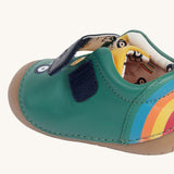 A close up of the velcro fastening on the side of the Fjord First Walker leather baby shoes in a holly green colour.