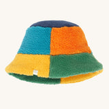 Frugi kids fleece bucket hat in hotchpotch available at Babipur. A 100% recycled polyester fleece bucket hat with a multicoloured block design