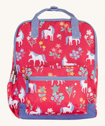 Frugi explorers backpack in rose horse floral. A pink backpack with lilac trim and a white unicorn print. Features a main compartment a smaller compartment on the front and a bottle holder