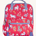 Frugi explorers backpack in rose horse floral. A pink backpack with lilac trim and a white unicorn print. Features a main compartment a smaller compartment on the front and a bottle holder