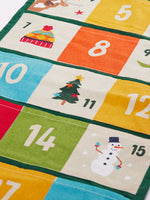 Colourful Frugi forest festive fun organic cotton advent calendar. 24 pockets with alternating colourful illustrations and colour blocks. 