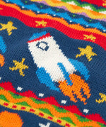 Close up of the details on the Frugi fowey Fairisle organic cotton knitted jumper with a space design featuring rockets, planets and stars. 