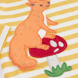 A close up of the squirrel applique on the front of the long sleeved top from the Frugi Frankie Outfit with a bumblebee yellow stripe and squirrel friends design. 