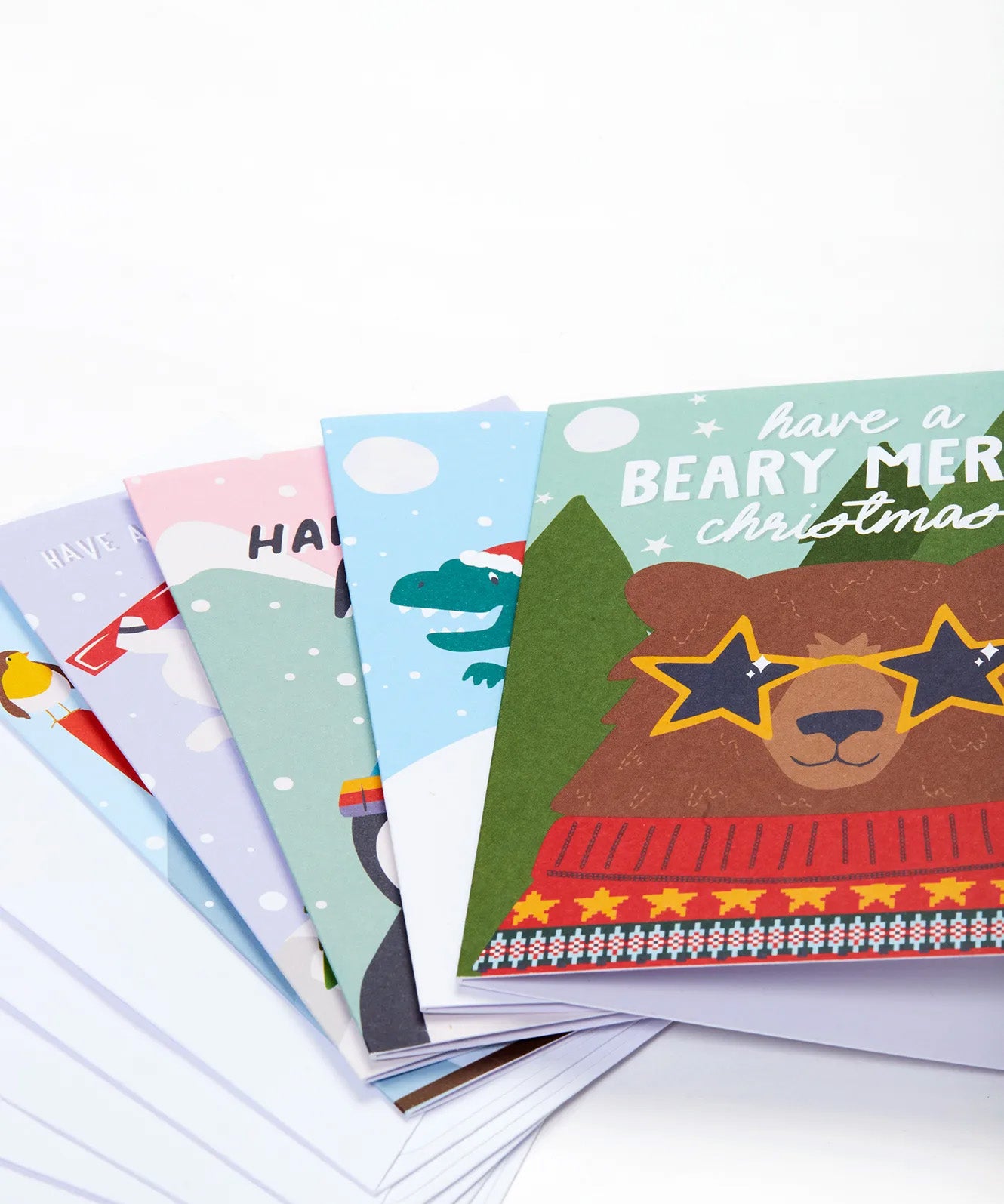 The five Frugi FSC Christmas Cards, on top is the bear design with the slogan "Have a beary merry Christmas"