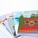 The five Frugi FSC Christmas Cards, on top is the bear design with the slogan "Have a beary merry Christmas"