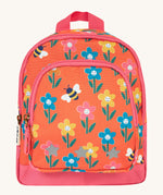 Frugi little adventures backpack in fun flowers. A small orange backpack with pink trim and multiple prints of playful flowers. Features 2 compartments and reflective stars