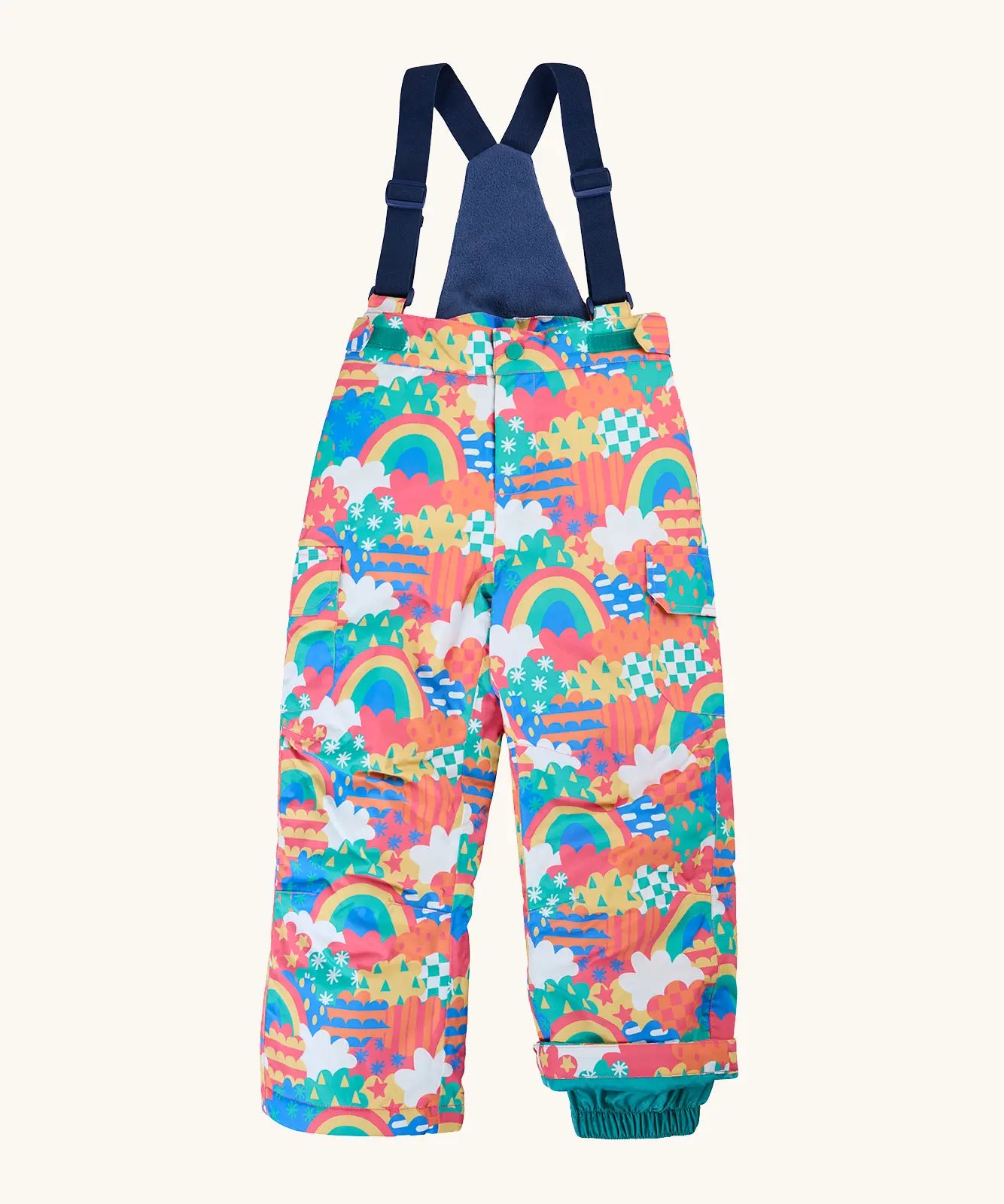 Frugi kids snow and ski salopettes fun frenzy showing a repeating rainbow and  pastel pattern design. Features removable straps and green legs cuffs