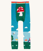 A view of the back of the Frugi organic cotton little knitted leggings with a fun guys red mushroom and farm design.