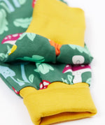 A close up of the yellow gold coloured cuffs of the Frugu fun guys mushroom design parsnip pants.