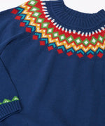 Close up of the Frugi fyfe knitted jumper in navy fair isle organic cotton. 