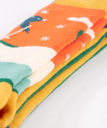  showing the print all around of the Yeti socks.
