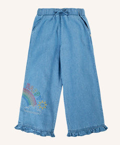 Frugi grace elasticated waist denim trousers with rainbow embroidery design and ruffle hem cuffs.
