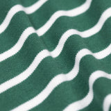 A close up of the soft organic cotton of the Frugi easy on long sleeved top holly green breton stripe with fox applique.