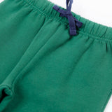 A close up of the navy coloured waist tie on the Frugi holly green coloured frog beaver crawlers kids organic ccotton joggers. 