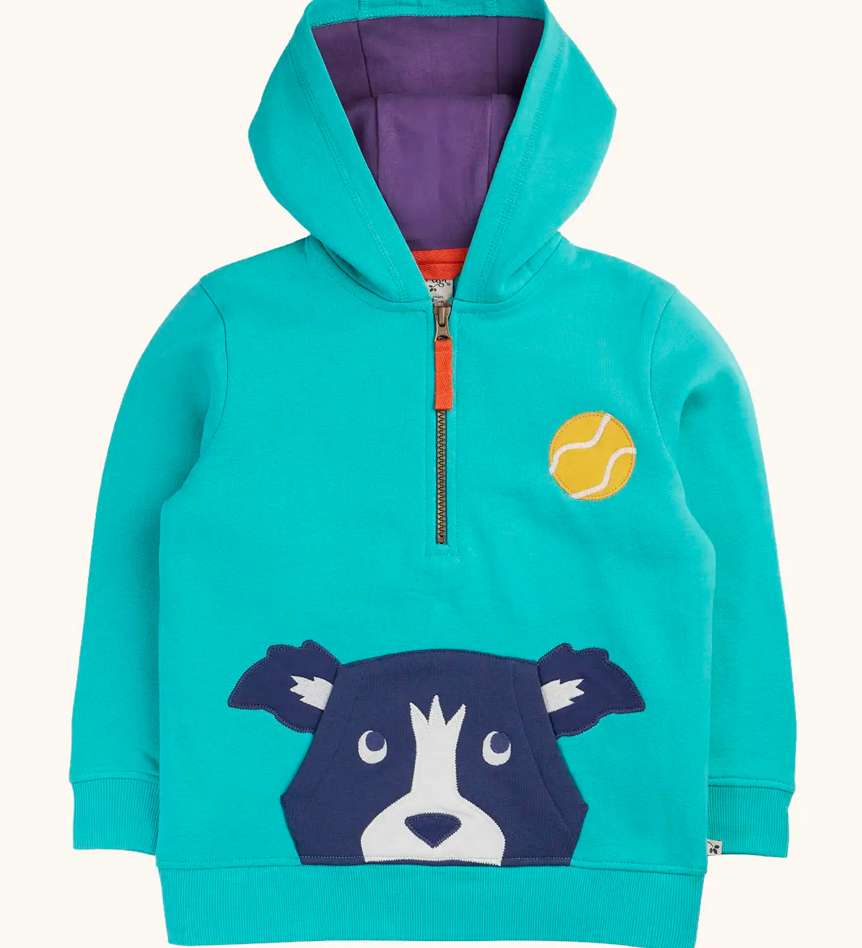 Frugi blue Hadley dog hoodie. Dog face applique incorporates a kangaroo pocket on the front. Quarter zip closre and purple lined hood.