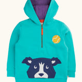 Frugi blue Hadley dog hoodie. Dog face applique incorporates a kangaroo pocket on the front. Quarter zip closre and purple lined hood.
