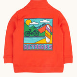 The back of the Frugi Half Zip Organic Cotton Papaya orange Jumper with large Outdoors colour block style graphic. A large square filled with an outdoor scene featuring a surfboard, bike, water, mountains and sun with the word outdoors written in bold font.