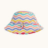 Frugi adjustable swim hat with a rainbow wave print in pink, white, yellow, purple, peach and turquoise.