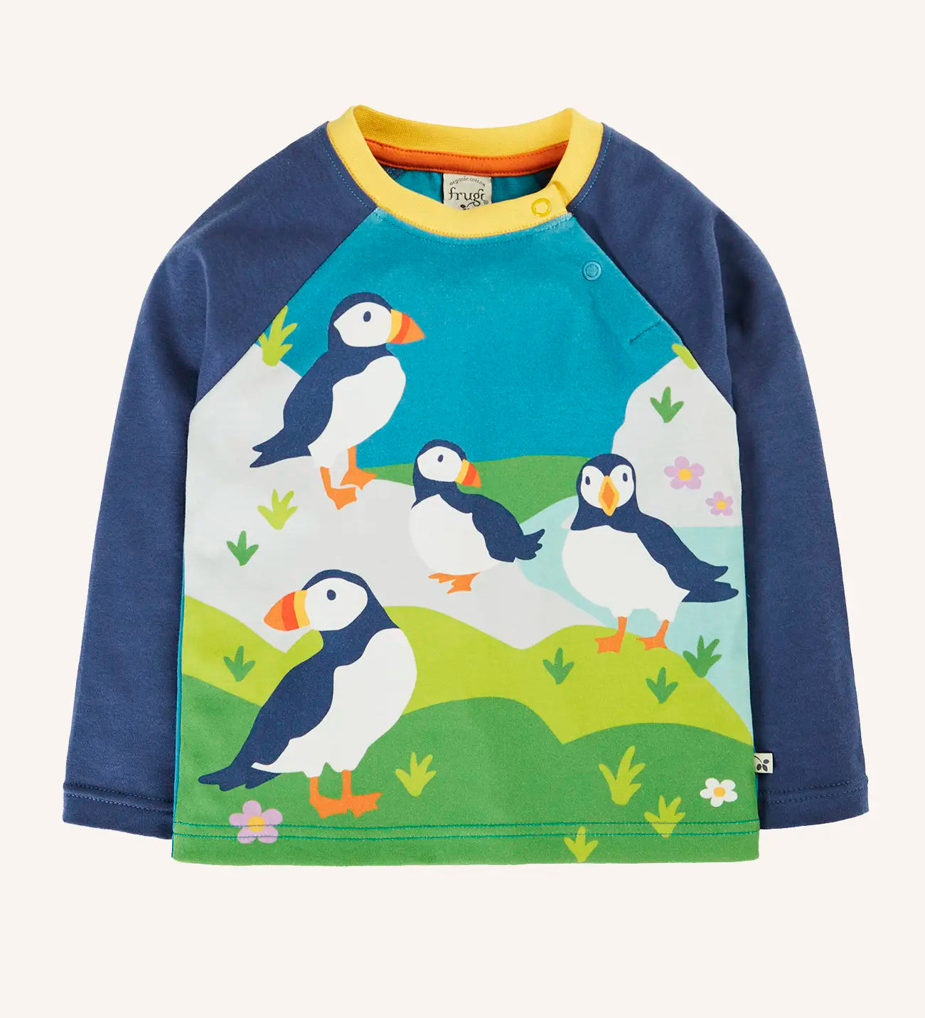 Frugi horizon raglan long sleeve organic cotton top featuring a puffin design on the front on the front and navy sleeves.