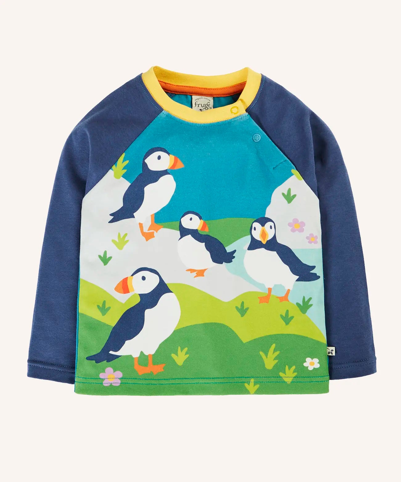 Frugi horizon raglan long sleeve organic cotton top featuring a puffin design on the front on the front and navy sleeves.