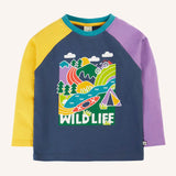 Frugi horizon raglan long sleeve organic cotton top in navy with purple and yellow sleeves featuring a large wildlife themed graphic on the front.