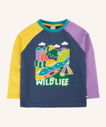 Frugi horizon raglan long sleeve organic cotton top in navy with purple and yellow sleeves featuring a large wildlife themed graphic on the front.