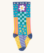 A close up of the floral inspired striped knee high sock from the Frugi kids hygge high knee socks in patchwork 2 pack. Showing the striped detail on organic cotton fabric.
