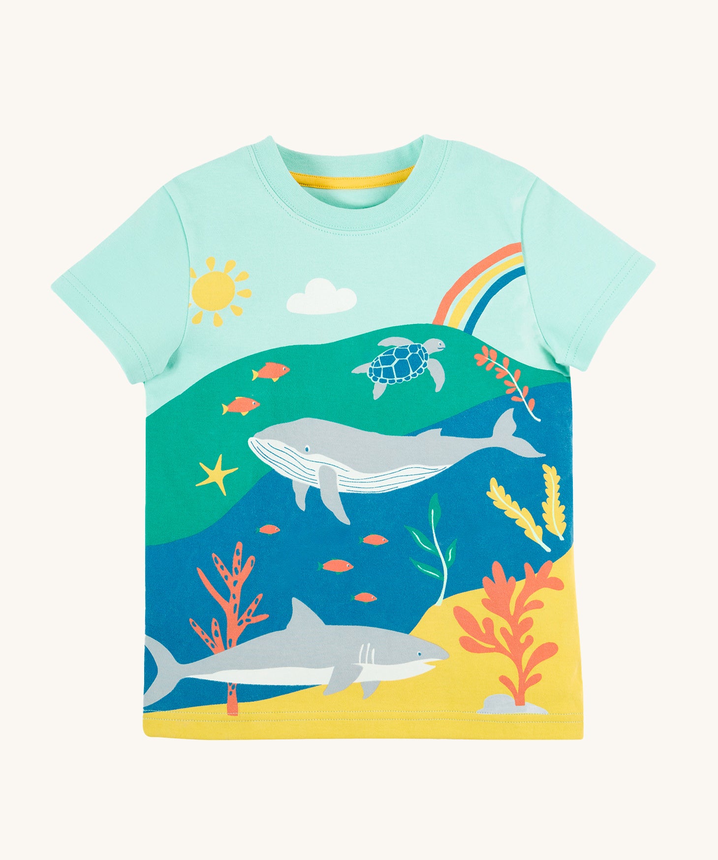 Frugi Iori Printed T-Shirt in Spring Mint laid flat, featuring a colourful Sea Life Scene which includes wales, sharks and other smaller fish, with the sun and a rainbow.