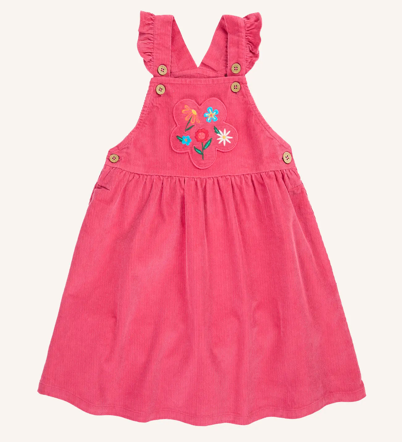 Frugi Isla pink rose dungaree dress with flowers embroidery on the front.