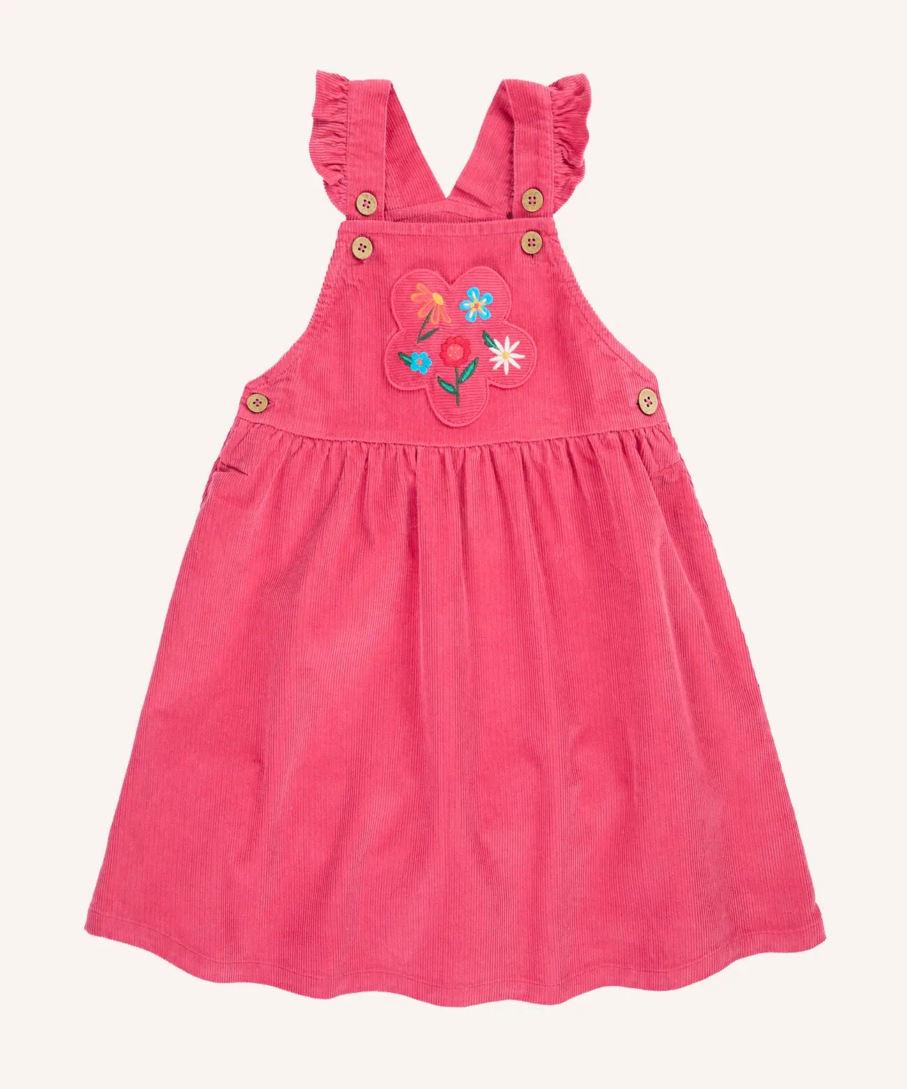 Frugi Isla pink rose dungaree dress with flowers embroidery on the front.