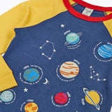 Close up of the Frugi Jake long sleeved applique top in navy blue with yellow sleeves with solar system appliques on the front