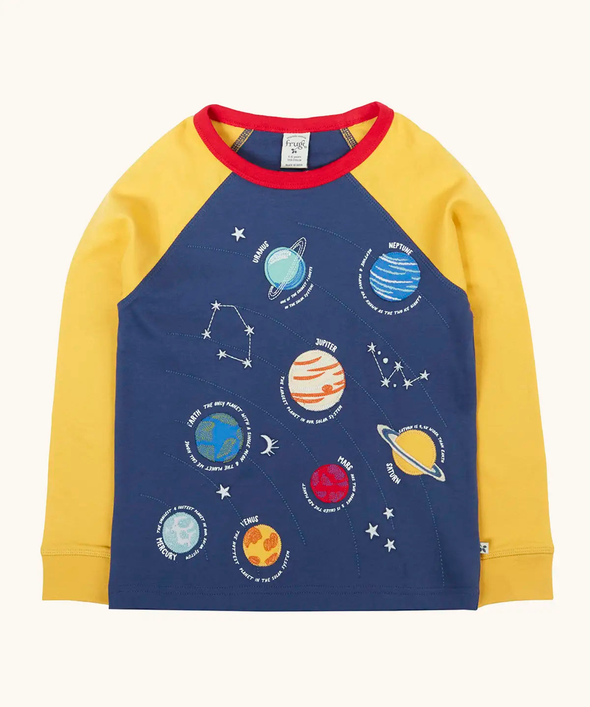 Frugi Jake long sleeved applique top in navy blue with yellow sleeves with solar system appliques on the front.