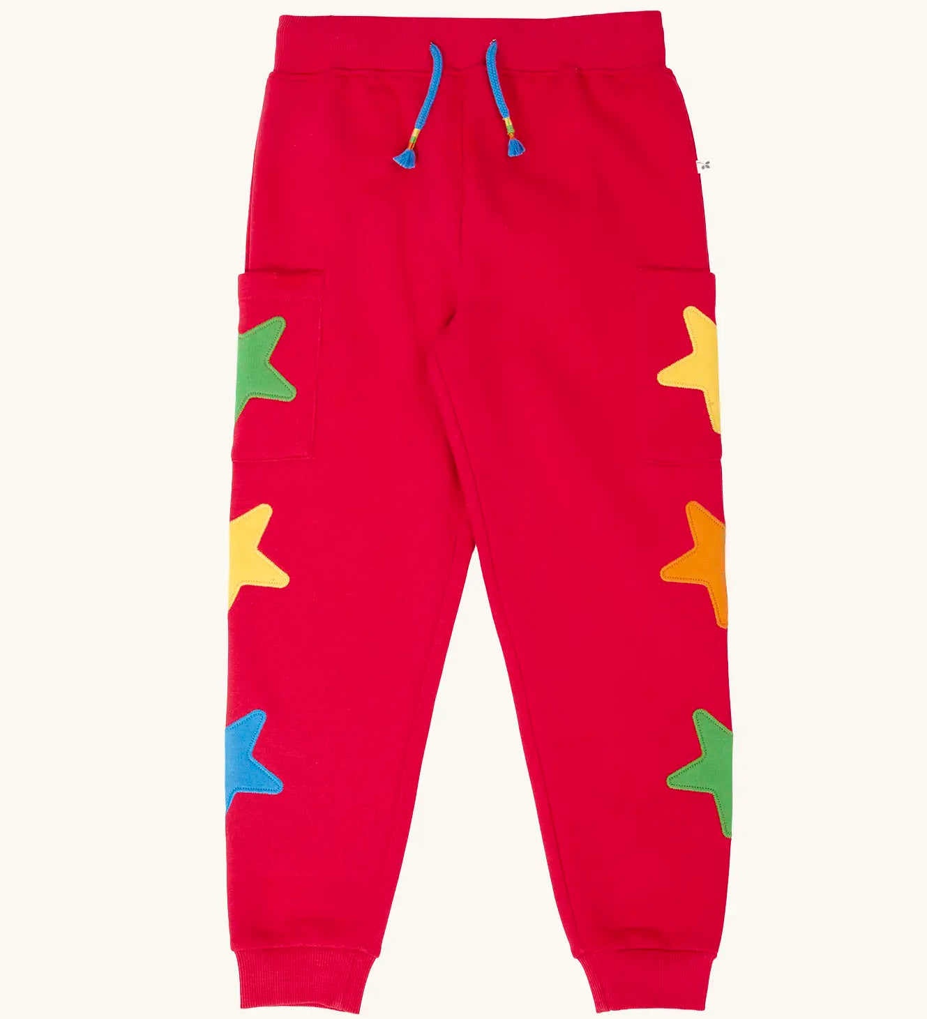 Frugi journey joggers in scarlet red with three stars appliques on each side.